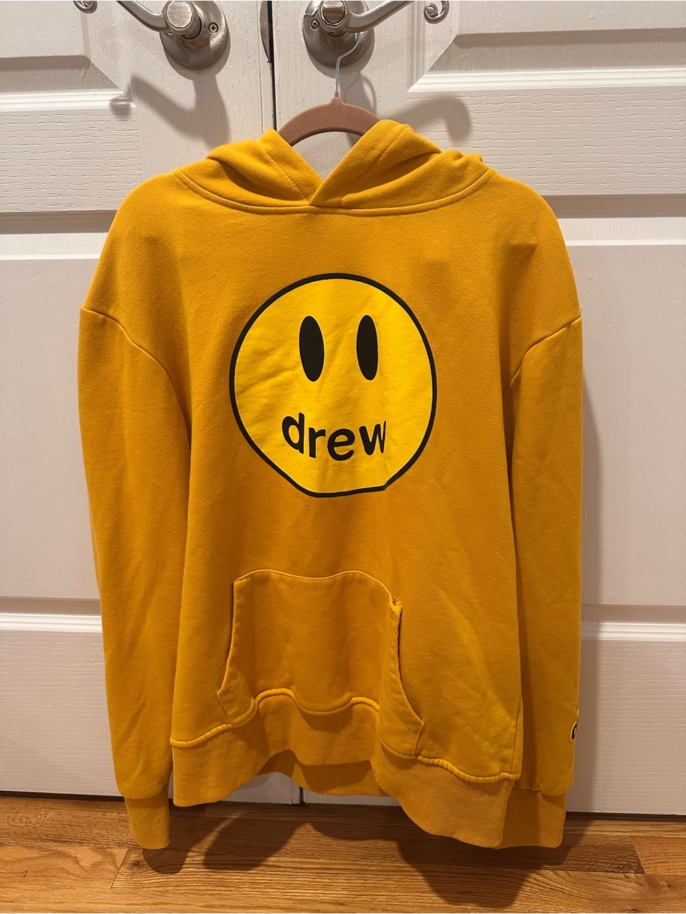 drew house yellow hoodie with black smiley logo